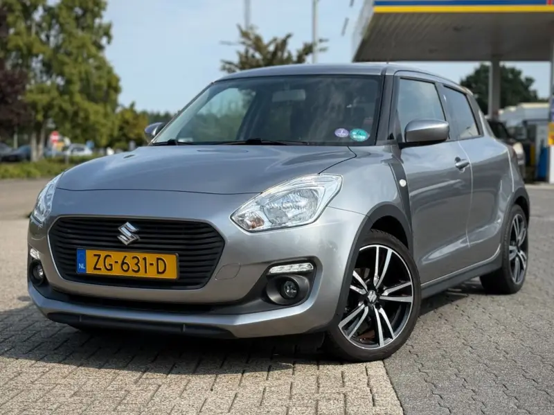 Suzuki Swift 1.2 SPORTLINE A/T TREKHAAK CARPLAY CAMERA 2019 leasen bij DreamLease: foto 1