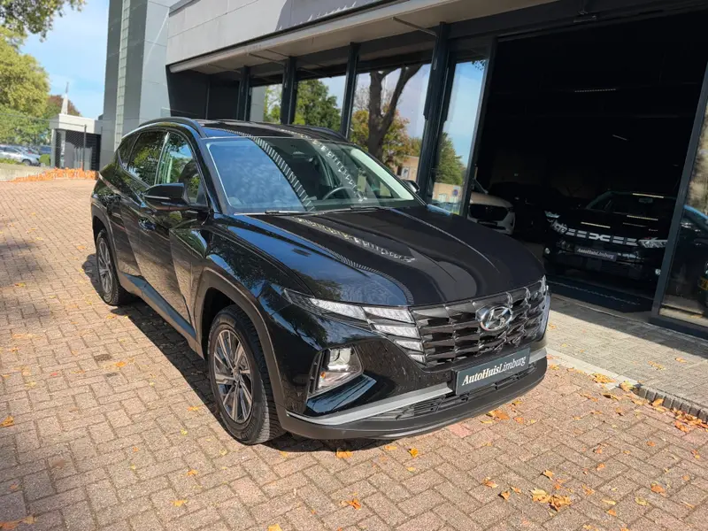 Hyundai Tucson 1.6 T-GDI HEV Comfort Smart|Camera|Nav|CarPlay|Nieuwstaat|Dealer Onderhouden 2021 leasen bij DreamLease: foto 1