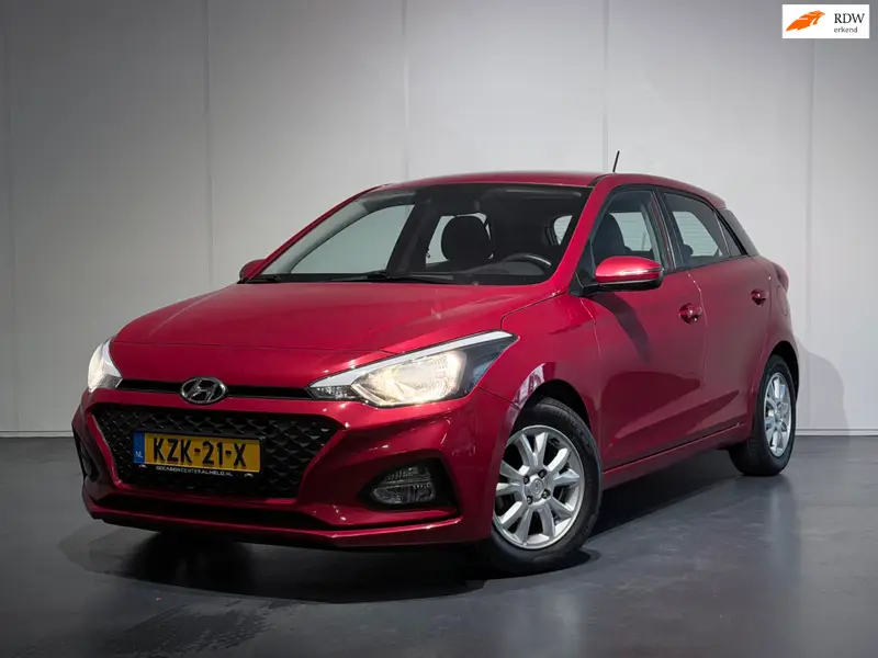 Hyundai i20 1.2 Premium /Airco/Cruise/PDC+Camera/CarPlay/LaneAss/LMV 2019 leasen bij DreamLease: foto 1