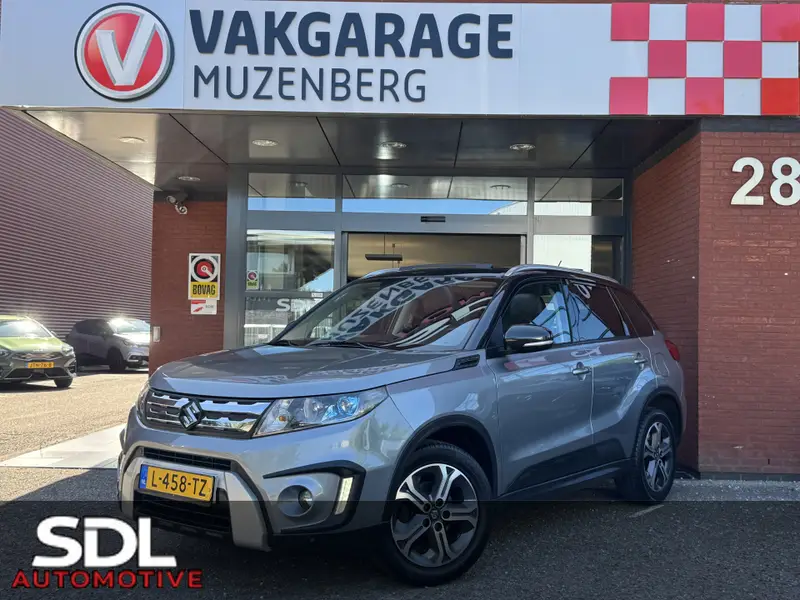 Suzuki Vitara 1.6 High Executive // SCHUIF-KANTELDAK // ADAPT. CRUISE // KEYLESS // CAMERA+SENSOREN // STOELVERWARMING // 2015 leasen bij DreamLease: foto 1