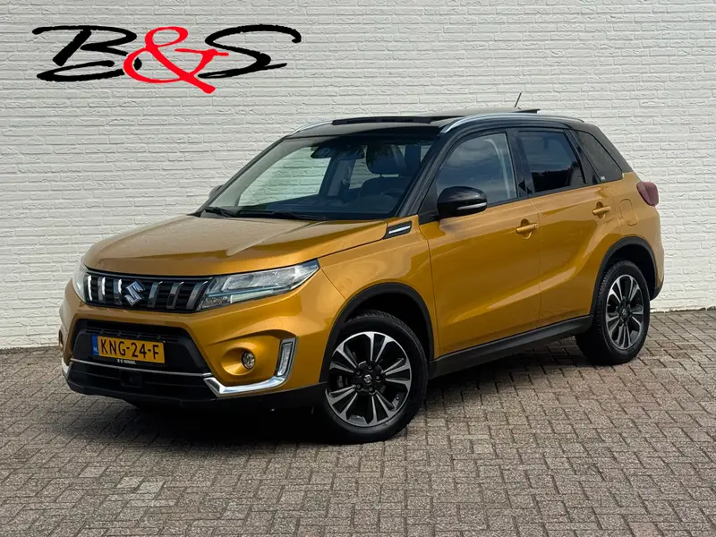 Suzuki Vitara 1.5 Hybrid Style Trekhaak Panorama dak Camera Adaptieve cruise Keyless Clima 2023 leasen bij DreamLease: foto 1
