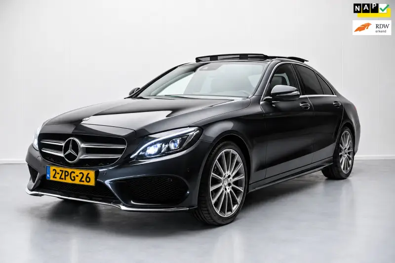 Mercedes-Benz C-Klasse 180 AMG Aut NL-auto [ Panoramadak Sfeerverlichting Leder Stoelverwarming 19 Inch Full-LED ] 2015 leasen bij DreamLease: foto 1