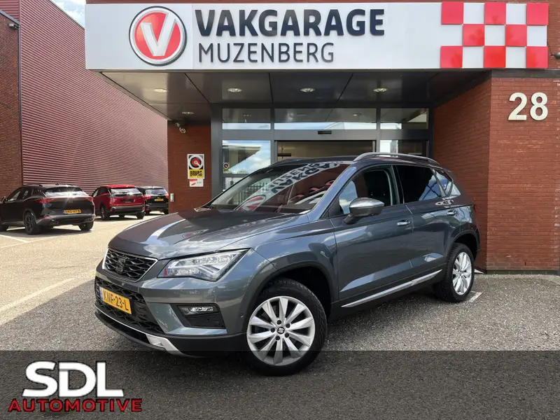 SEAT Ateca 1.4 EcoTSI Xcellence // NAVI // PDC // CRUISE // CLIMA // ELEK. ACHTERKLEP // DODEN HOEK SENSOR // 2018 leasen bij DreamLease: foto 1