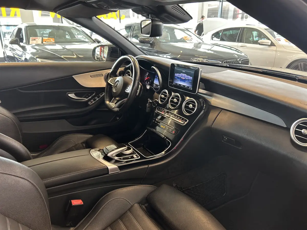 Mercedes-Benz C-Klasse Cabrio 250 Edition 1 AMG | Cruise control | Climate control | Lane assist | Airscarf | Stoelverwarming | Lederen bekleding | Elek. inklapbare spiegels | Navigatie: foto 2