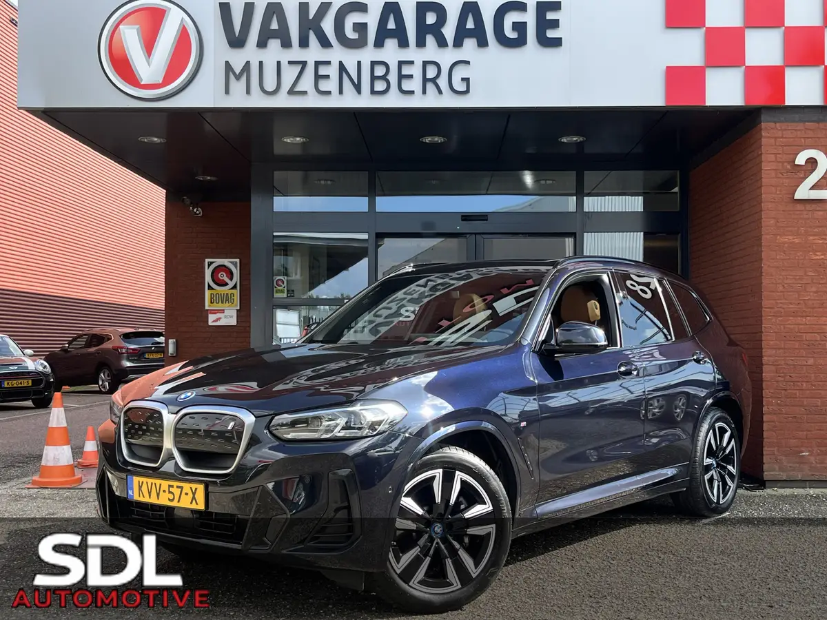BMW iX3 High Executive 80 kWh M Sport // SOH 100% // SCHUIF-KANTELDAK // LEDER+ELEK. STOELEN // ELEK. KLEP// ADAPT. CRUISE // CAMERA: foto 1