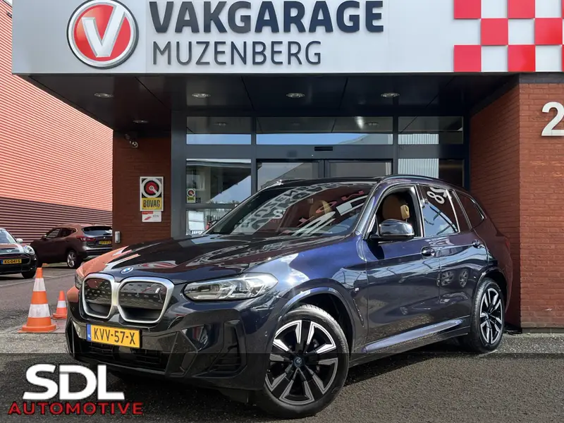 BMW iX3 High Executive 80 kWh M Sport // SOH 100% // SCHUIF-KANTELDAK // LEDER+ELEK. STOELEN // ELEK. KLEP// ADAPT. CRUISE // CAMERA 2022 leasen bij DreamLease: foto 1