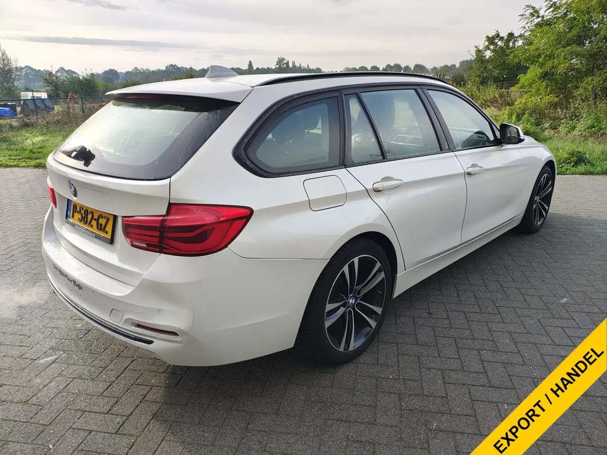 BMW 3 Serie Touring 318i Automaat Sport Panoramadak Stoelverwarming Shadow High Executive Navi Camera Ecc: foto 2