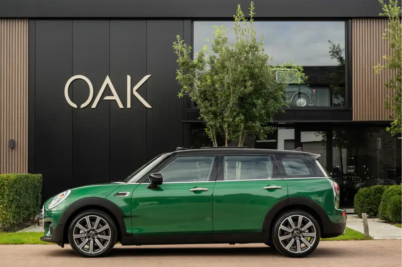 MINI Clubman 1.5 Cooper Aut. | Navigatie | Panorama | Chester Leder | PDC | 18"LM | NL Auto | British Racing Green 2022 leasen bij DreamLease: foto 1
