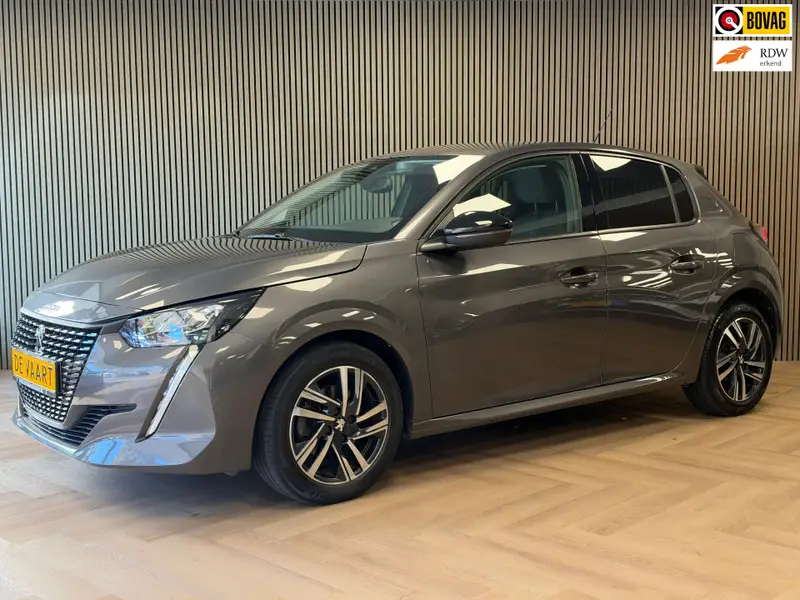 Peugeot 208 1.2 PureTech Allure Pack LED CLIMAT CRUISE CONTROL PDC CARPLAY LANE ASSIST 2023 leasen bij DreamLease: foto 1