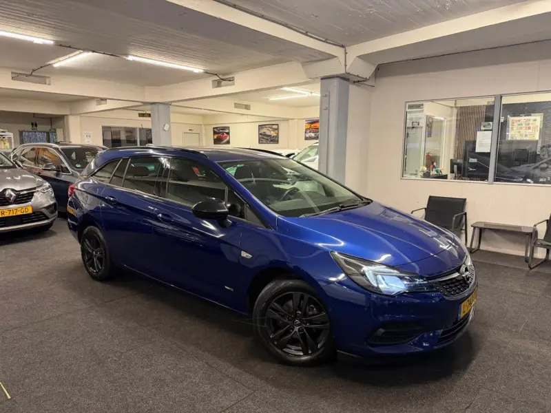 Opel Astra Sports Tourer*Carplay*NAP*Vel 1.2 Design & Tech*Camera*Carplay*NAP*Velgen 2021 leasen bij DreamLease: foto 1