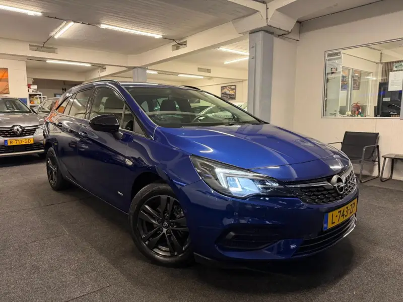 Opel Astra Sports Tourer*Carplay*NAP*Vel 1.2 Design & Tech*Camera*Carplay*NAP*Velgen 2021 leasen bij DreamLease: foto 2