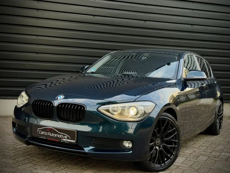 BMW 1 Serie 116i Executive AUT|CLIMA|XENON|NAVI|PDC 2014 leasen bij DreamLease: foto 1