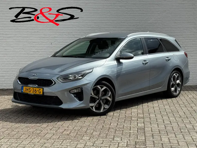 Kia Ceed Sportswagon 1.4 T-GDi DynamicLine Dealeronderhouden Cruise control Climate control Navigatie Apple / Android Trekhaak 2019 leasen bij DreamLease: foto 1