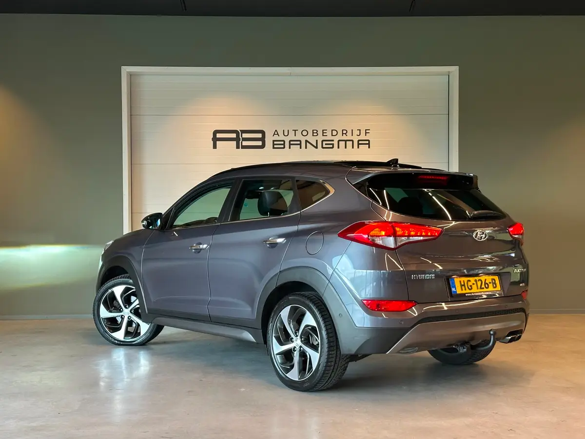 Hyundai Tucson 1.6 T-GDi 4WD AUTOMAAT PREMIUM|CLIMA AIRCO|PANORAMADAK|CRUISECONTROL|LEDEREN BEKLEDING|TREKHAAK|XENON|NAVIGATIE|NAP: foto 2