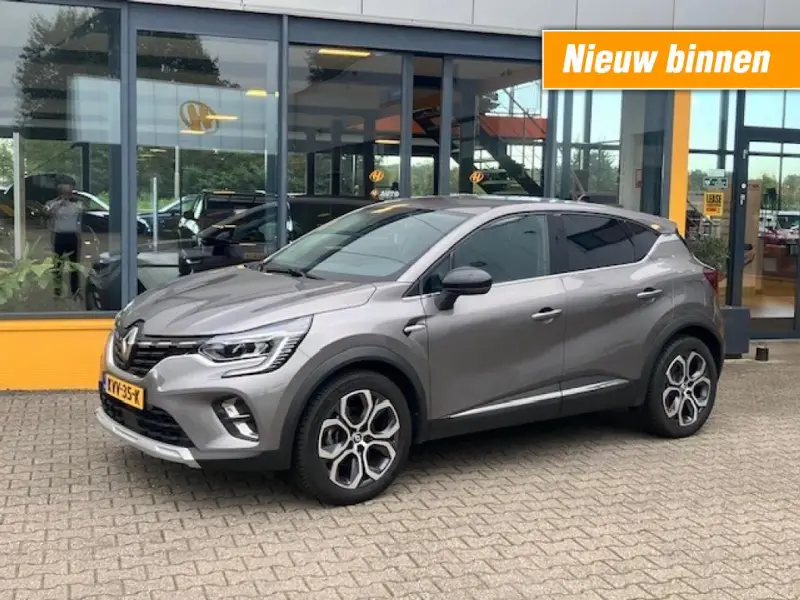Renault Captur 1.6 E-Tech Plug 160 Intens - Navi - Carplay/Android - camera - all season 2023 leasen bij DreamLease: foto 1