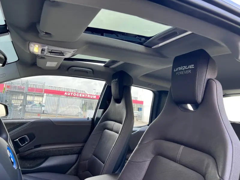 BMW i3 *Unique Forever*120Ah 42 kWh/H-Kardon/Sunroof/2xAdaptive/W-pomp/1eEig./20" 2022 leasen bij DreamLease: foto 2