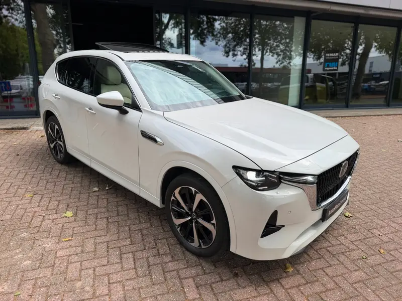Mazda CX-60 2.5 e-SkyActiv PHEV Takumi|Garantie 7/2029|Camera|CarPlay|Pano|Trekhaak|HUD|Nieuwstaat 2023 leasen bij DreamLease: foto 1