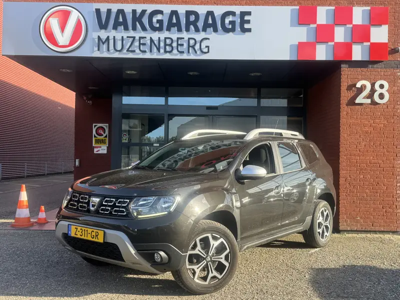 Dacia Duster 1.6 SCe Prestige // 360° CAMERA // NAVI // CLIMA // STOELVERWARMING // CRUISE // BLIND SPOT MONITOR // 2019 leasen bij DreamLease: foto 1