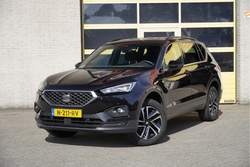 SEAT Tarraco 1.5 TSI 150PK! Style Business Intense BJ2021 Lmv 18" | Led V+A | Pdc | Elek. trekhaak | Achteruitrijcamera | App-Connect | Navi | Virtual cockpit | Dashboard verlichting | Climate control | Cruise control | Sportstoelen | Zwarte hemel | Beats Audio Systee 2021 leasen bij DreamLease: foto 1