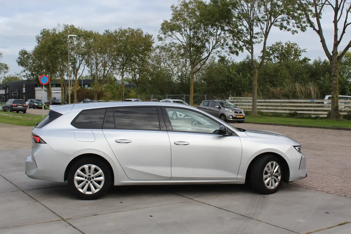 Opel Astra Sports Tourer 1.2 Business Edition AGR-stoel dealer onderhouden camera bomvol: foto 2