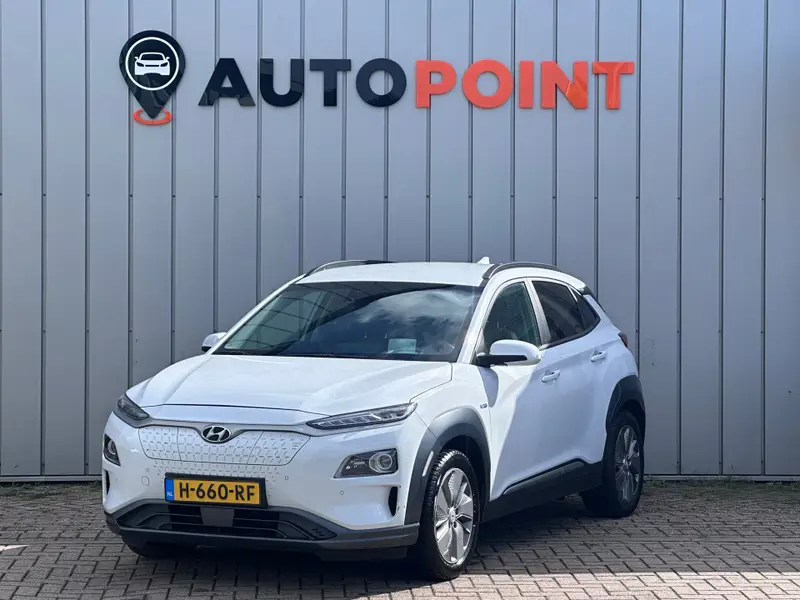 Hyundai Kona EV Premium 64 kWh WPOMP TREKHAAK SOH 99% 1 EIG DEALER OND HEAD-UP 2020 leasen bij DreamLease: foto 1