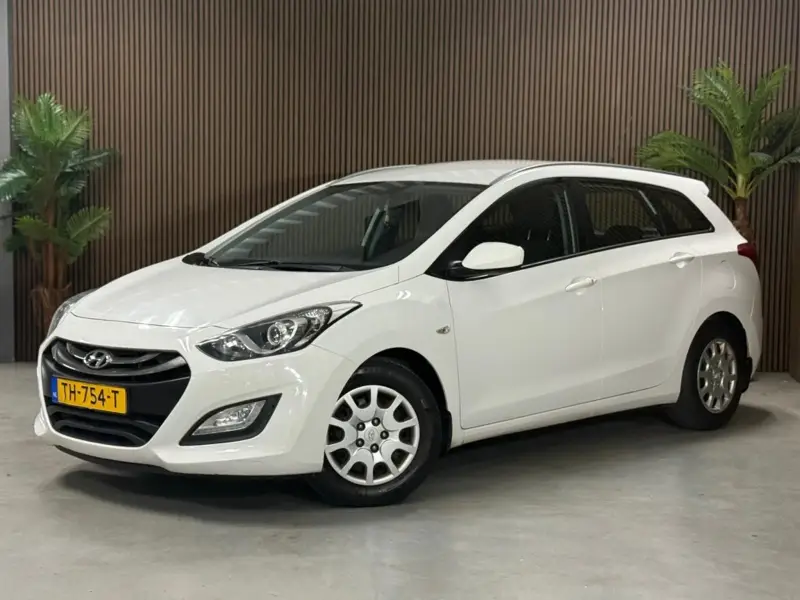 Hyundai i30 Wagon 1.4 Garantie, nieuw ketting 2014 leasen bij DreamLease: foto 1