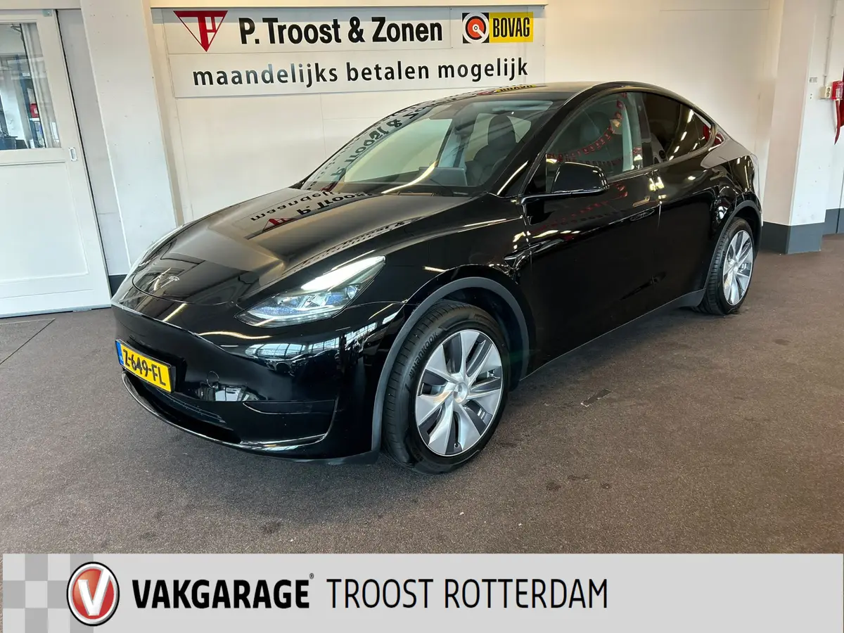 Tesla Model Y RWD 58 kWh Nederlandse auto | Panoramadak | Afneembare trekhaak | Stoelverwarming | Achteruitrijcamera | Parkeersensoren rondom | Lederen bekleding: foto 1