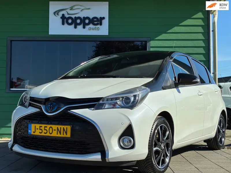 Toyota Yaris 1.5 Hybrid Dynamic Bi-Tone|Automaat|Camera|Navigatie|PDC|CruiseControl|Climatronic|Stoel Verw.|Goed onderhouden| 2016 leasen bij DreamLease: foto 1