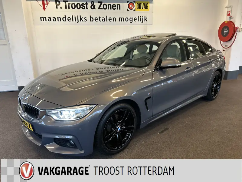 BMW 4 Serie Gran Coupé 418i Individual M-pakket Schuifkanteldak/Automaat/Navigatie/Climate controle/Cruise cotrole/Lederen bekleding+stoelverwarming/Xenon/LED dagrijverlichting/Parkeersensoren achter/Nederlandse auto/Dealeronderhouden 2016 leasen bij DreamLease: foto 1