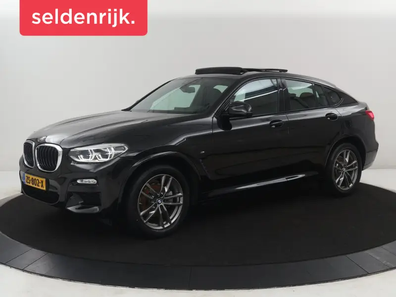 BMW X4 xDrive20i High Executive Edition M-sport | Panoramadak | Leder | Trekhaak | Camera | 2019 leasen bij DreamLease: foto 1