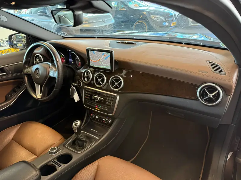 Mercedes-Benz GLA 200 Edition 1 AMG | Cruise control | Climate control | Lederen bekleding | Achteruitrijcamera | Navigatie | Bluetooth | Parkeersensoren | Elek. inklapbare spiegels 2014 leasen bij DreamLease: foto 2