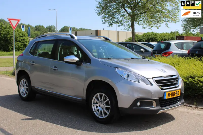 Peugeot 2008 1.2 PureTech ALLURE PACK PREMIUM PLUS|CLIMA AIRCO|CRUISECONTROL|HALF LEER|LM-VELG|nieuwe APK+OH BEURT+DISTRIBUTIERIEM 2015 leasen bij DreamLease: foto 1