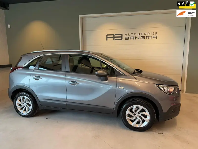 Opel Crossland X 1.2 TURBO ONLINE EDITION|CLIMA AIRCO|NAVIGATIE|LM-VELG|CRUISE CONTROL|ISOFIX|2eEIGENAAR|98.732 km NAP|nwe D-RIEM! 2019 leasen bij DreamLease: foto 1
