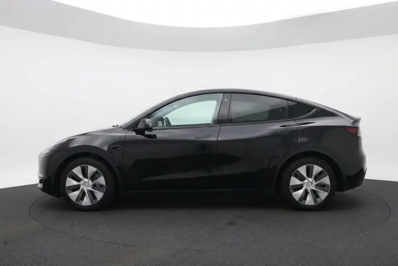 Tesla Model Y Long Range AWD 75kWh 93% SOH FSD3 l Warmtepomp l Trekhaak afneembaar 2022 leasen bij DreamLease: foto 2