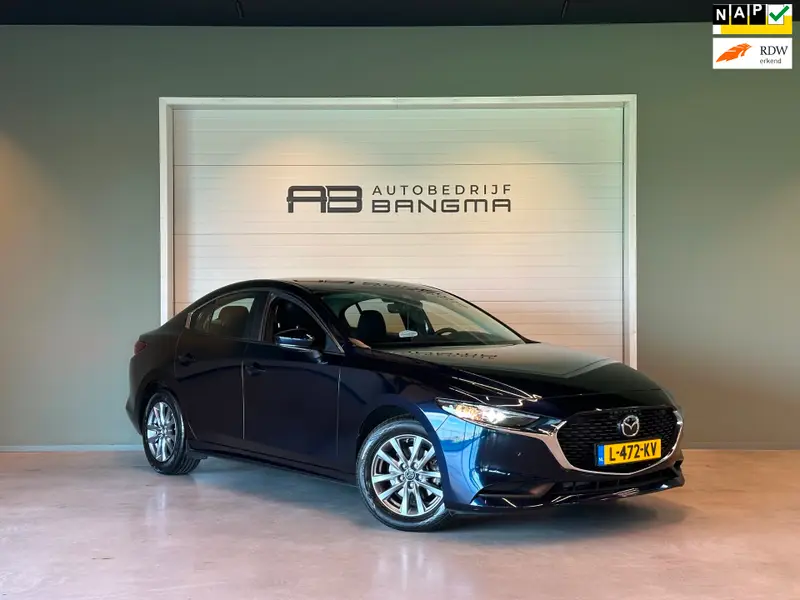 Mazda 3 2.0 e-SkyActiv-G M Hybrid 122 COMFORT-uitv|NAVIGATIE|CLIMA AIRCO|ADAPTIVE CRUISE CONTROL|LM-VELG|HEAD UP DISPLAY|XENON 2021 leasen bij DreamLease: foto 1
