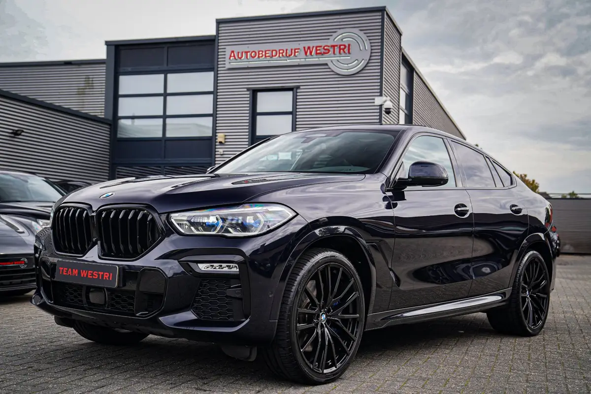 BMW X6 XDrive40i High Executive | Panorama | 360cam | Carbon | Adaptieve cruise control | Kristallen pook | 22 inch | Dealer onder: foto 1