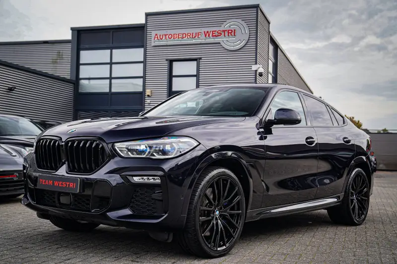 BMW X6 XDrive40i High Executive | Panorama | 360cam | Carbon | Adaptieve cruise control | Kristallen pook | 22 inch | Dealer onder 2020 leasen bij DreamLease: foto 1