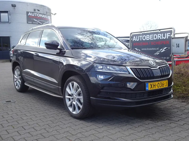 Škoda Karoq 116PK TSI Clever Edition Autom. 2019 leasen bij DreamLease: foto 1