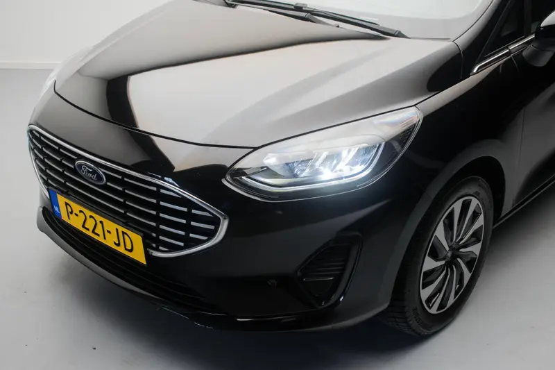 Ford Fiesta 1.0 EcoBoost 125PK Hybrid Titanium NL-auto [ Carplay LED Draadloze Telefoonlader Parkeersensoren Climate Control ] 2022 leasen bij DreamLease: foto 2